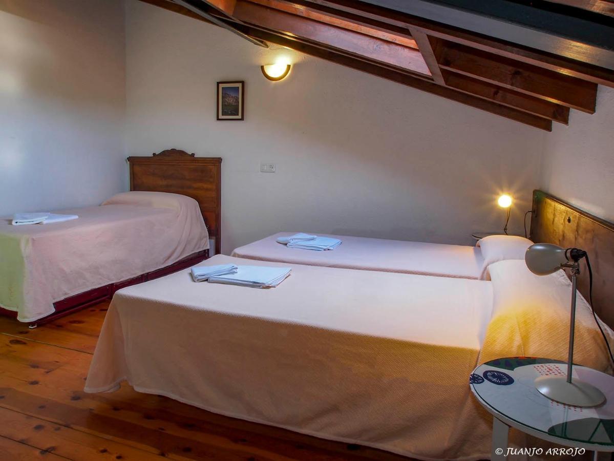 Casa De La Montana Albergue Turistico Avín Esterno foto